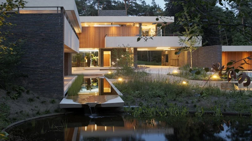 avondlicht duinvilla aan water hba architecten