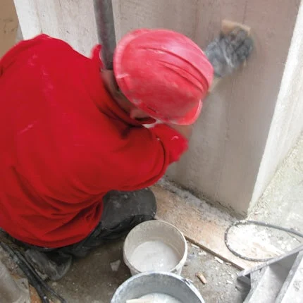 handmatig afwerken betongevel villa waalre