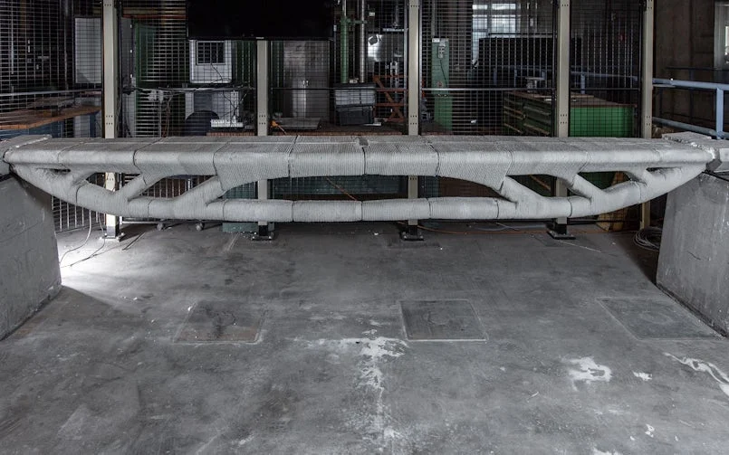 Topologisch ontwerp van een 3D-betongeprinte ligger, waarbij het materiaal het krachtsverloop volgt (foto: Summum Engineering)