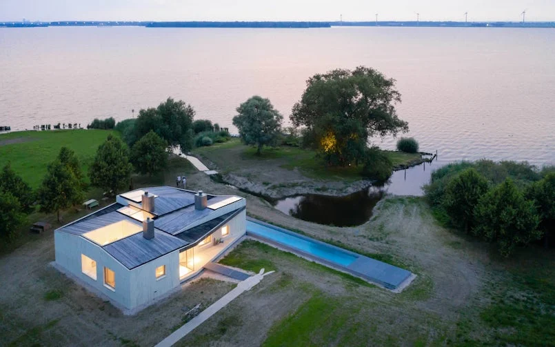 luchtfoto huis raboes betonwoning met omgeving