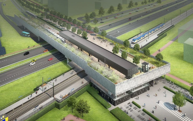luchtfoto van station lansingerland zoetermeer met het betonnen gebouw als brug over de snelweg en zicht op sporen