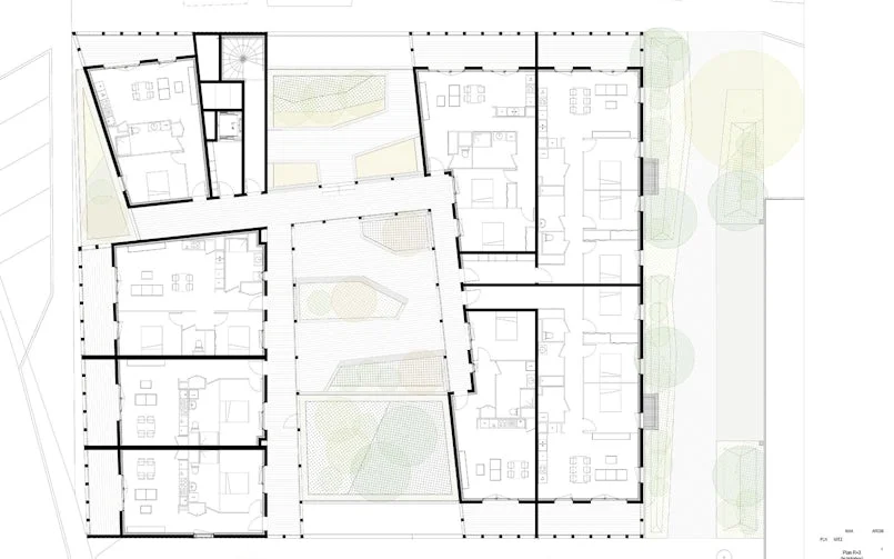 De derde tot vijfde bouwlaag bestaat uit woningen, dit is de derde verdieping met de daktuin en kolommen voor de luchtbrug erboven (tekening: W Architectures)